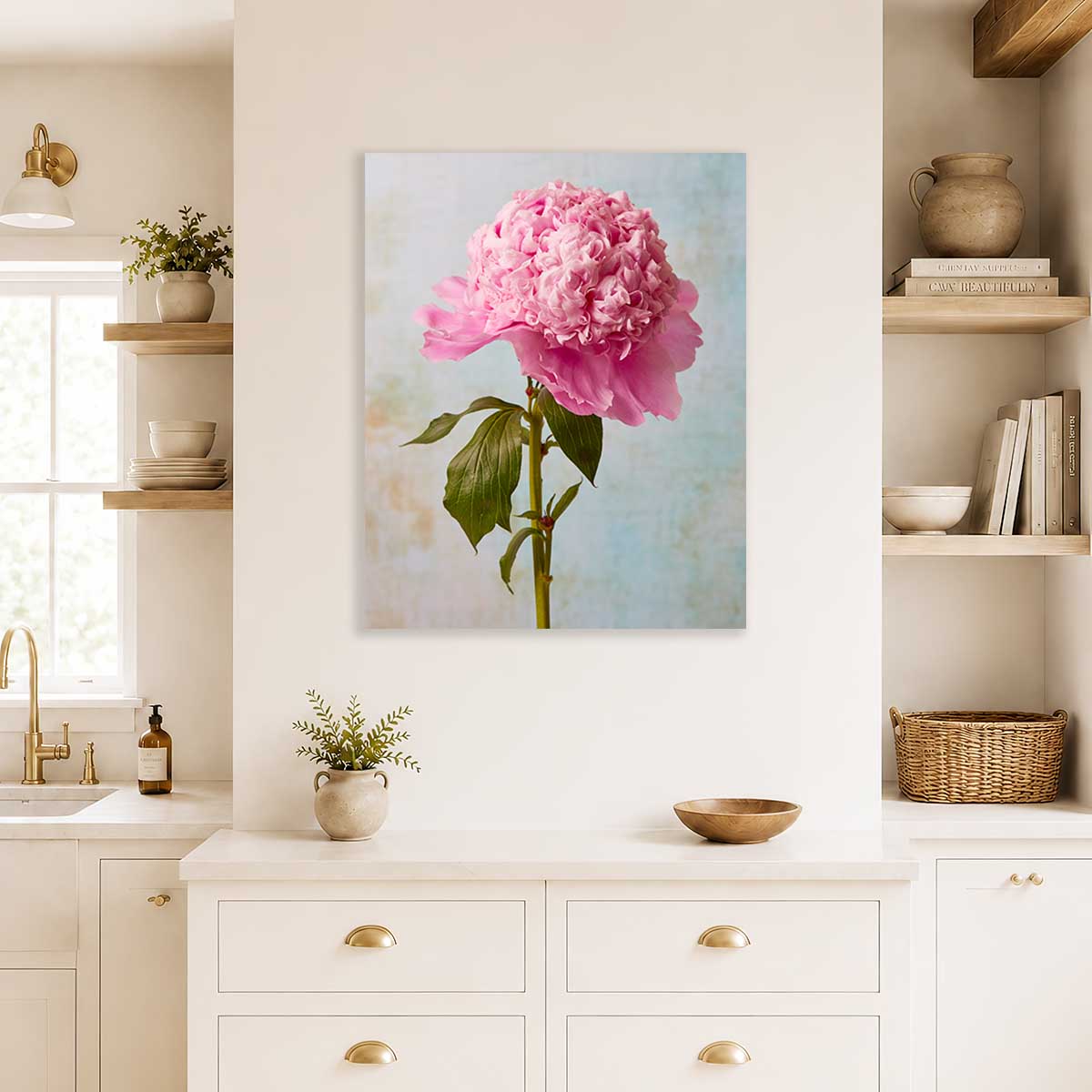 Miss Stoic Peony Wall Art Canvas with pink peony bloom and green leaves on a soft blue background