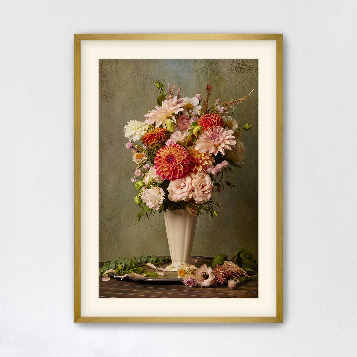 A framed image of a vase filled with a vibrant bouquet of flowers, including various types of blooms in shades of pink, orange, and white, set against a neutral background.