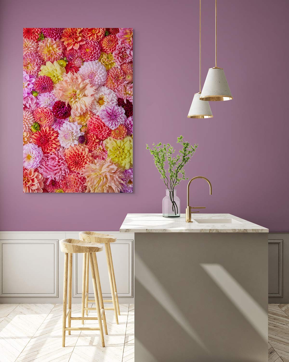 A modern kitchen with a purple accent wall showcases the Dahlia Bed - Blooming Radiance. The space features a marble island with a gold faucet, two wooden stools, pendant lights, and a vase of green branches on the countertop to enhance the rooms elegance.