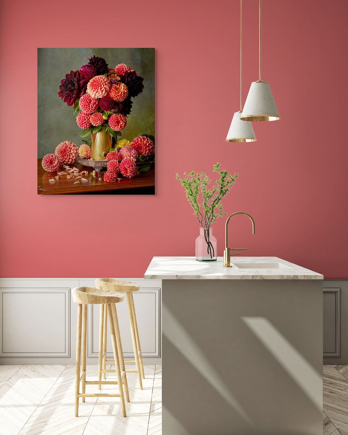 A modern kitchen with a pink accent wall showcases a marble countertop island, two wooden bar stools, and white pendant lights. The Late Summer Glow canvas wall art hangs on the wall.