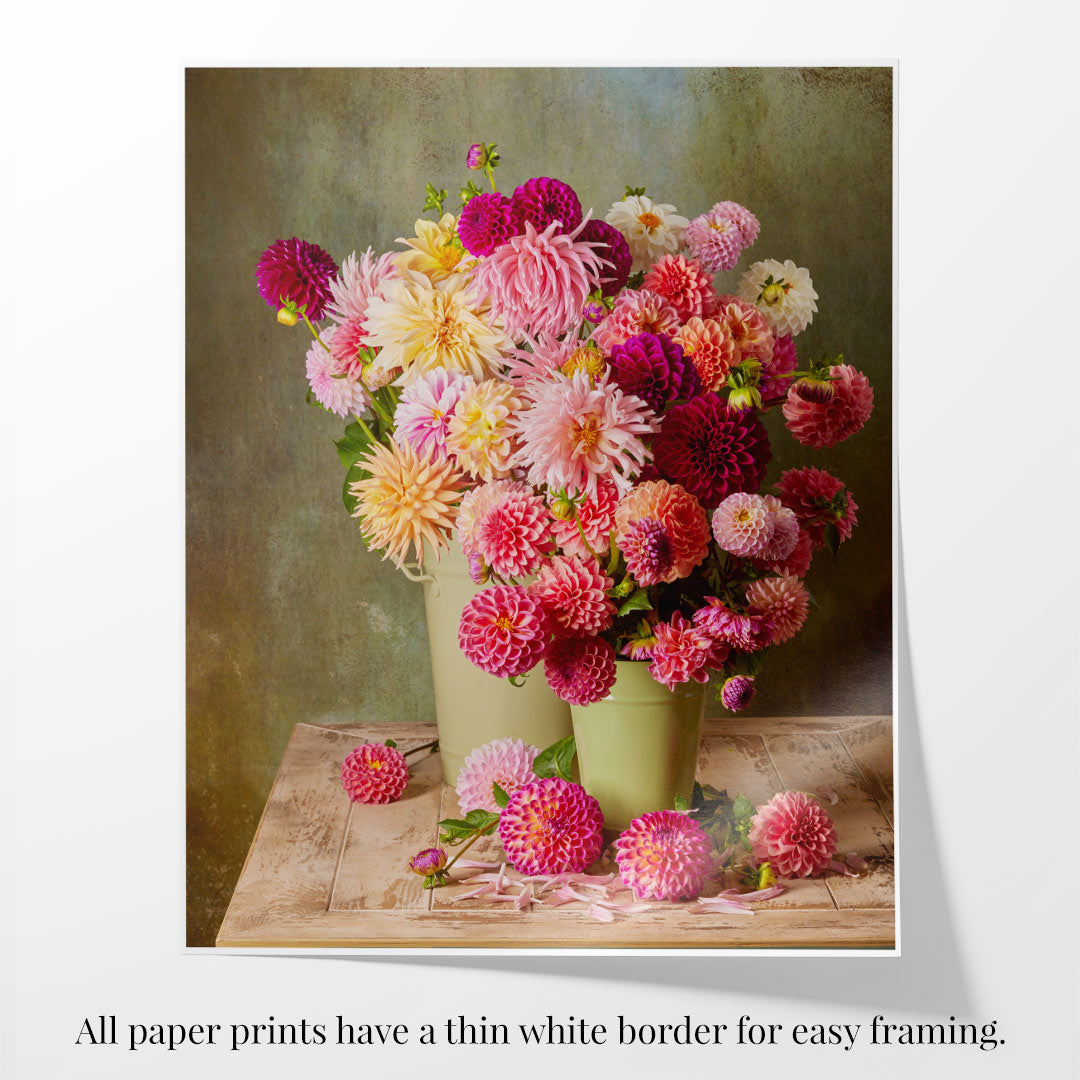 The Dahlia Harvest print features a vibrant bouquet of pink, red, and white dahlias in a light green vase on a wooden table. All prints include a thin white border for easy framing.