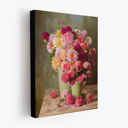 Side view of the Dahlia Harvest canvas wall art showcasing two green buckets holding dahlias in pink, cream, red and yellow. The canvas has a 1.5-inch black edge, producing a floating effect.