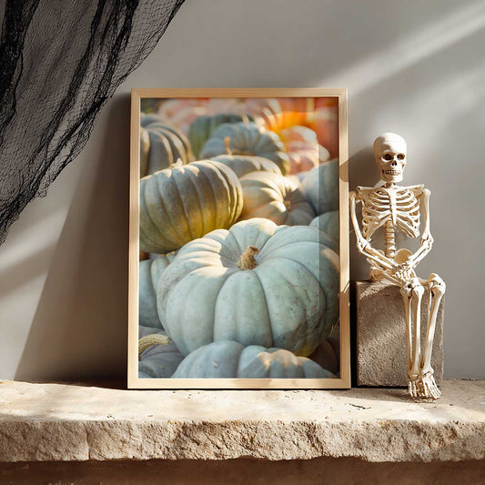 Enchanted Autumn vertical wall art in sage green and teal with carved pumpkin scene, framed beside a skeleton