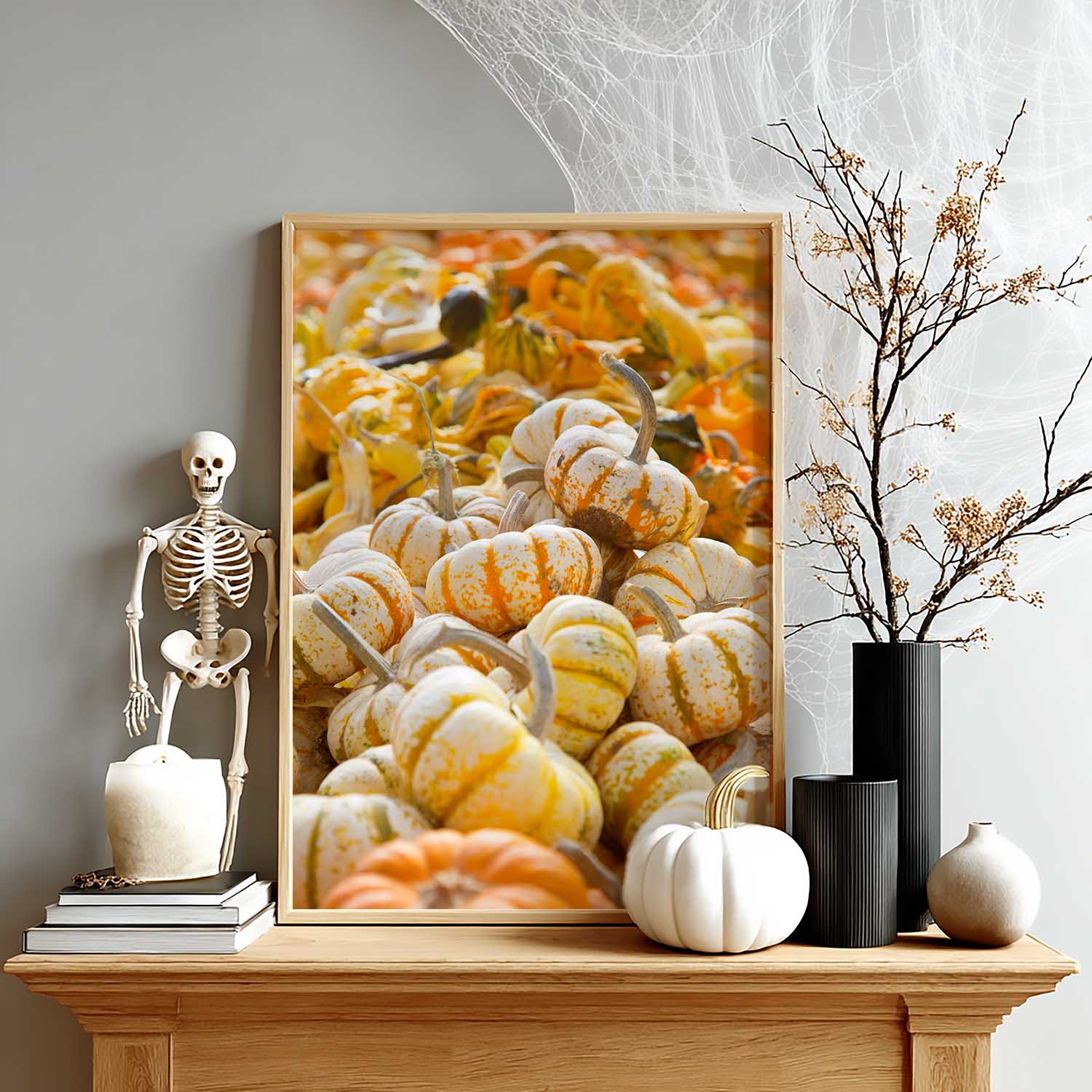 Maple wood framed artwork of pumpkins on a wooden shelf with decorative items.