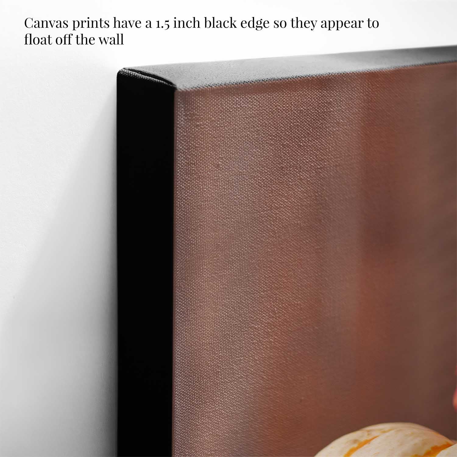 Close up of a canvas print with a black edge on a white background