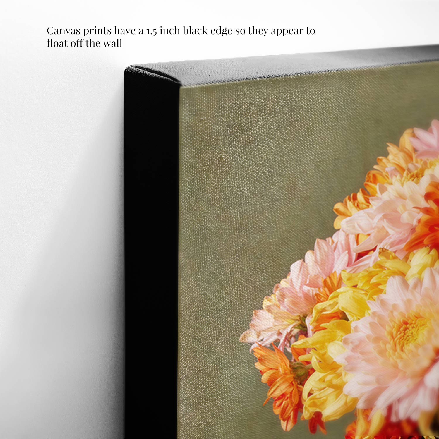 Close-up of Harvested Harmony, a canvas wall art print with a 1.5-inch black edge, showcasing vibrant orange and pink autumn flowers on a lush green background. The canvas prints have a 1.5 inch black edge so they appear to float off the wall.