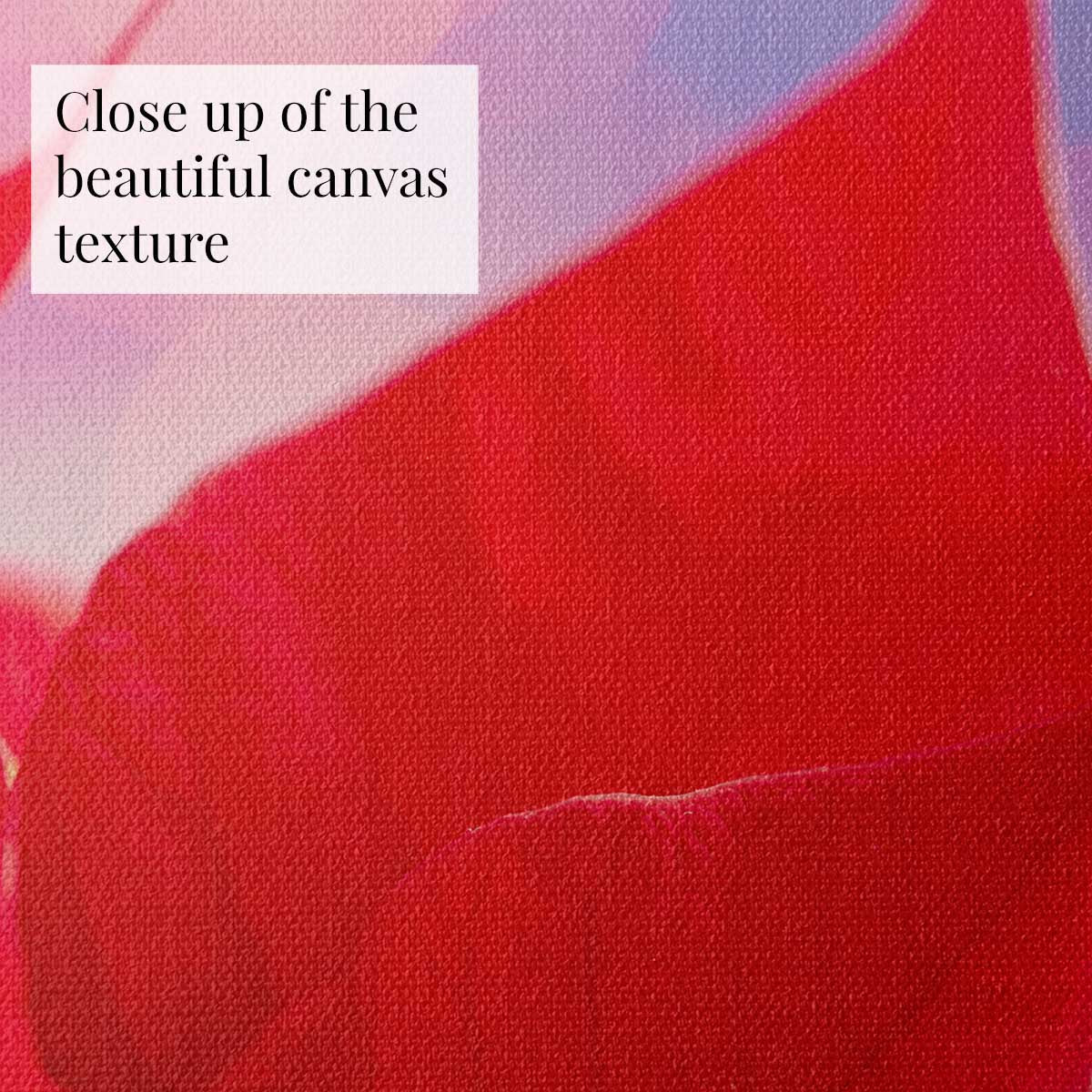 Poinsettia wall art canvas in red and pink with a close up view of the woven texture for vertical display.