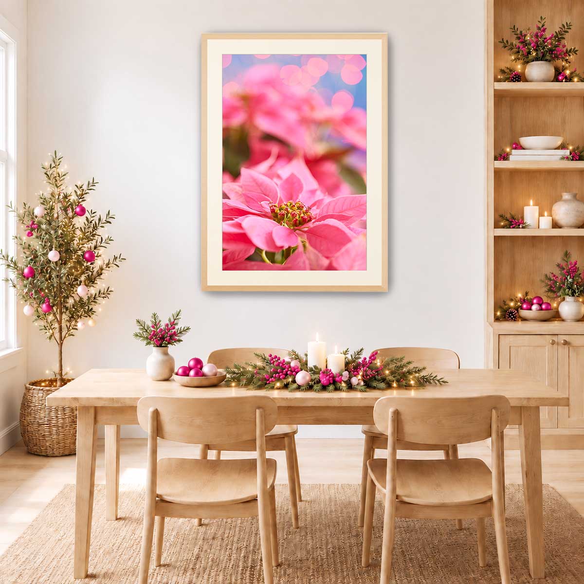 Pink winter poinsettia Christmas wall art print with a detailed floral composition in a light wood frame.