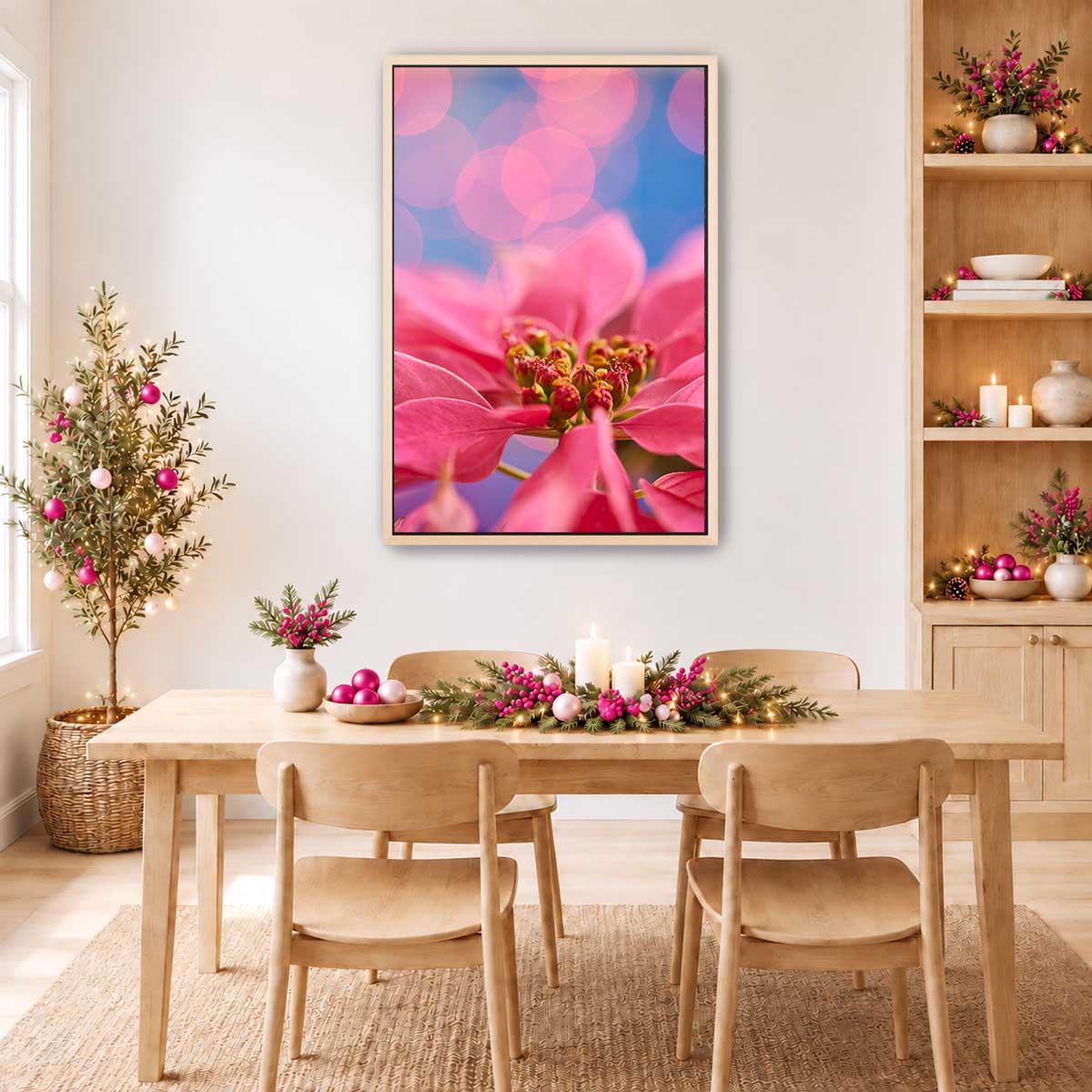 A very pink Christmas floral wall art print featuring a detailed poinsettia bloom with blurred lights for holiday decor