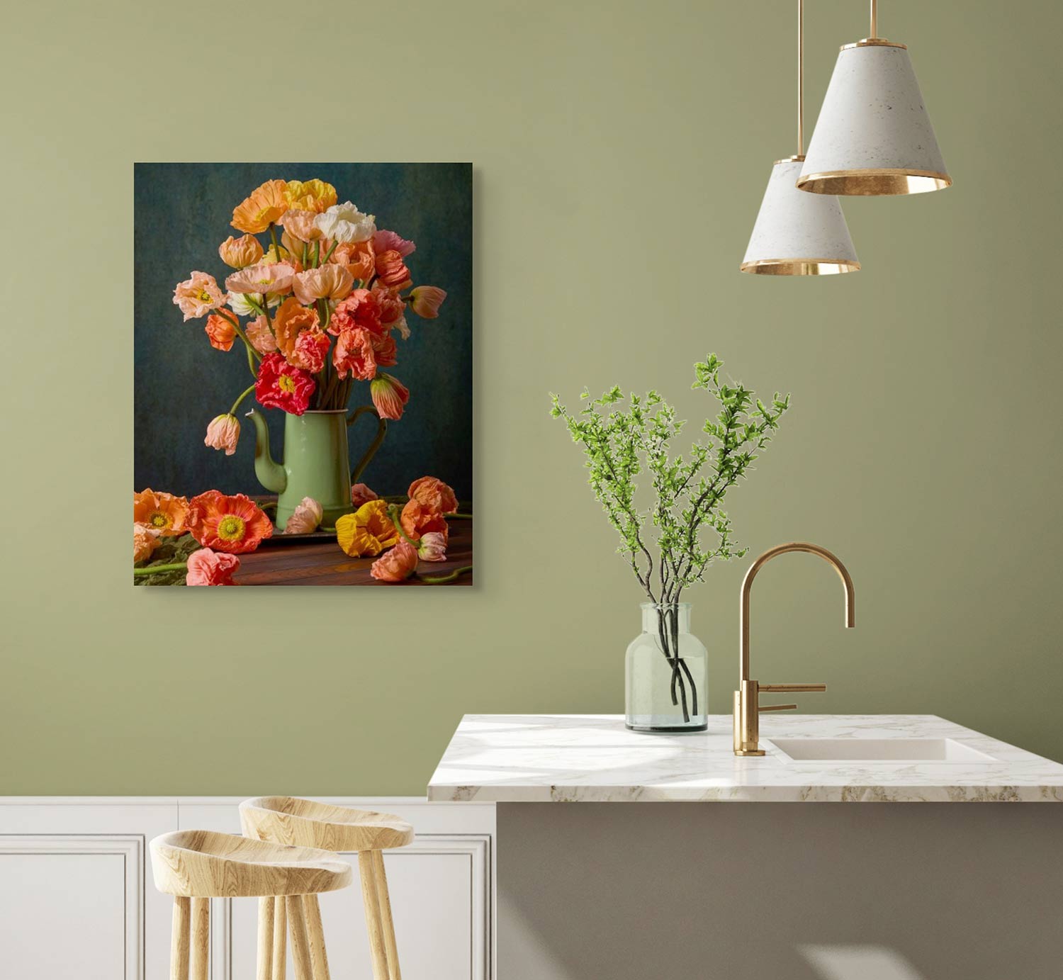 A kitchen with light green walls features a marble countertop, a vase with branches beside a modern faucet, and an Italian pastel Poppy Sisters Portraits - 3 Piece art above. Two cone-shaped pendant lights illuminate this stylish space.