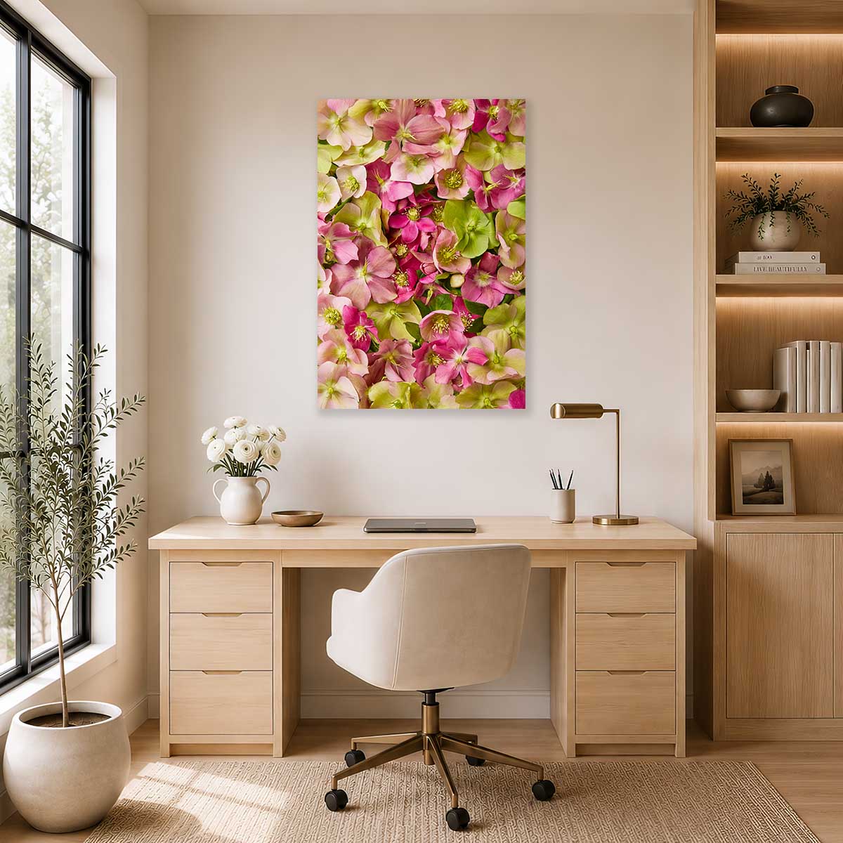 Winter Roses Hellebore wall art canvas with pink and green flowers in a bright home office setting