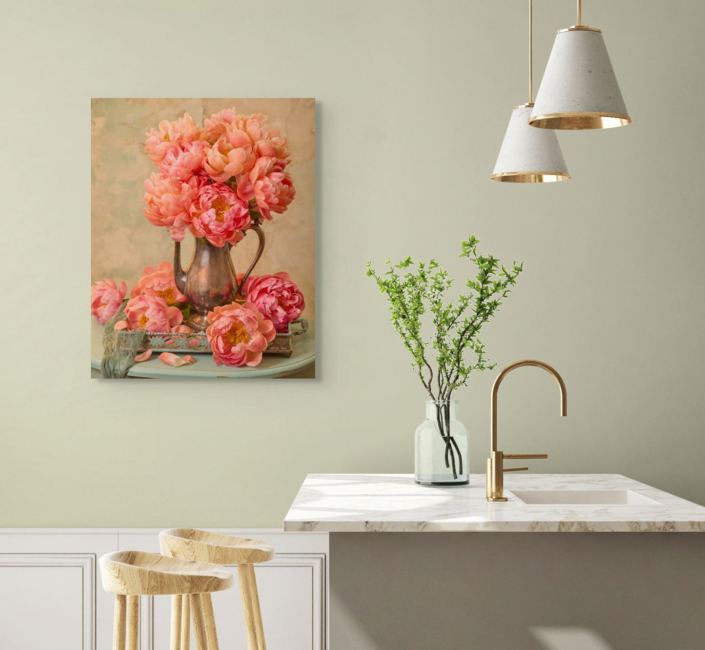 In a modern kitchen, a wooden stool complements a marble countertop holding a vase with green branches. The light green wall displays Coral Radiance, canvas wall art, while two pendant lights illuminate the space.