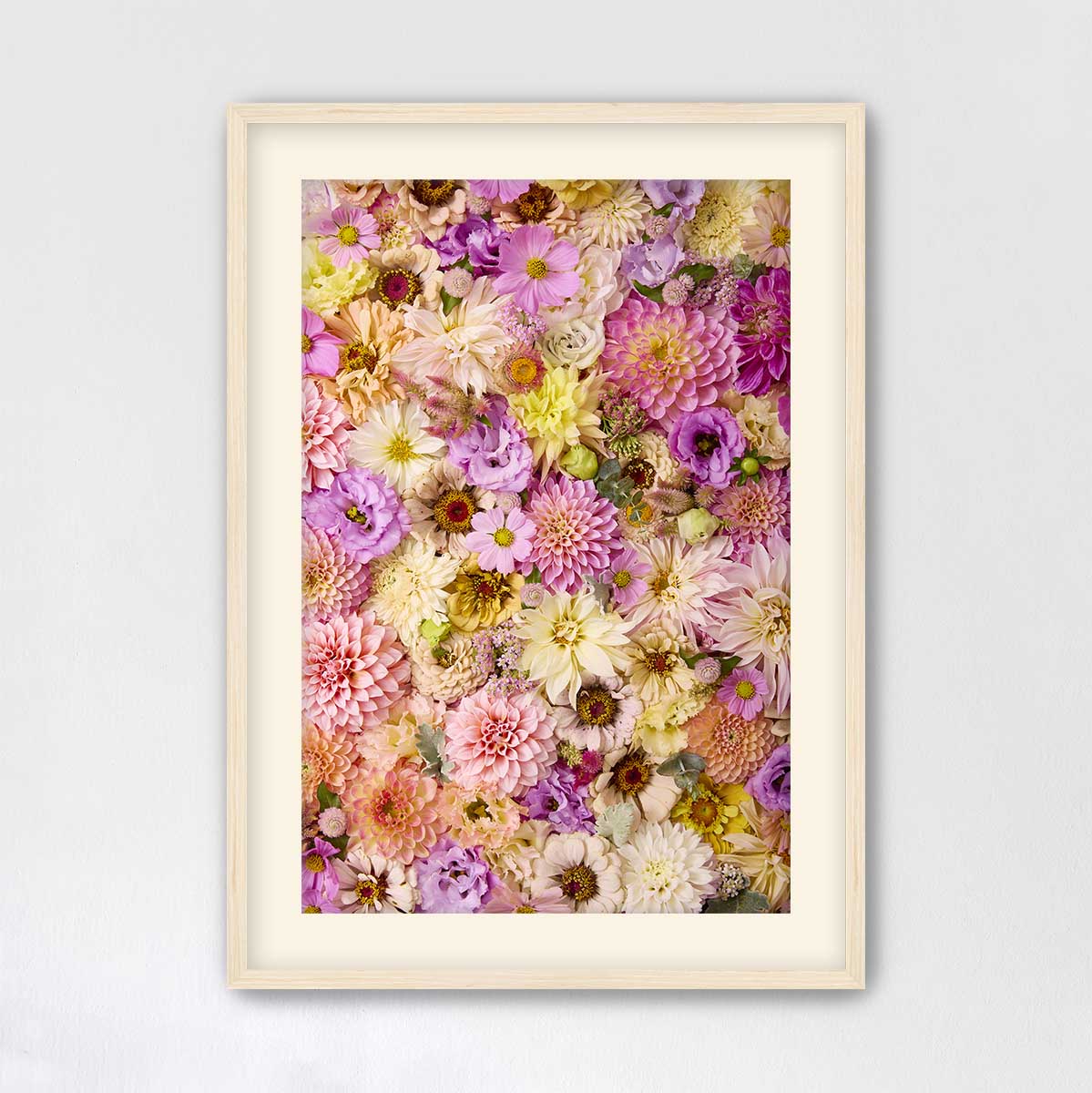 The image is a framed collage of various colorful flowers, including dahlias, peonies, and other blooms in shades of pink, yellow, and purple.