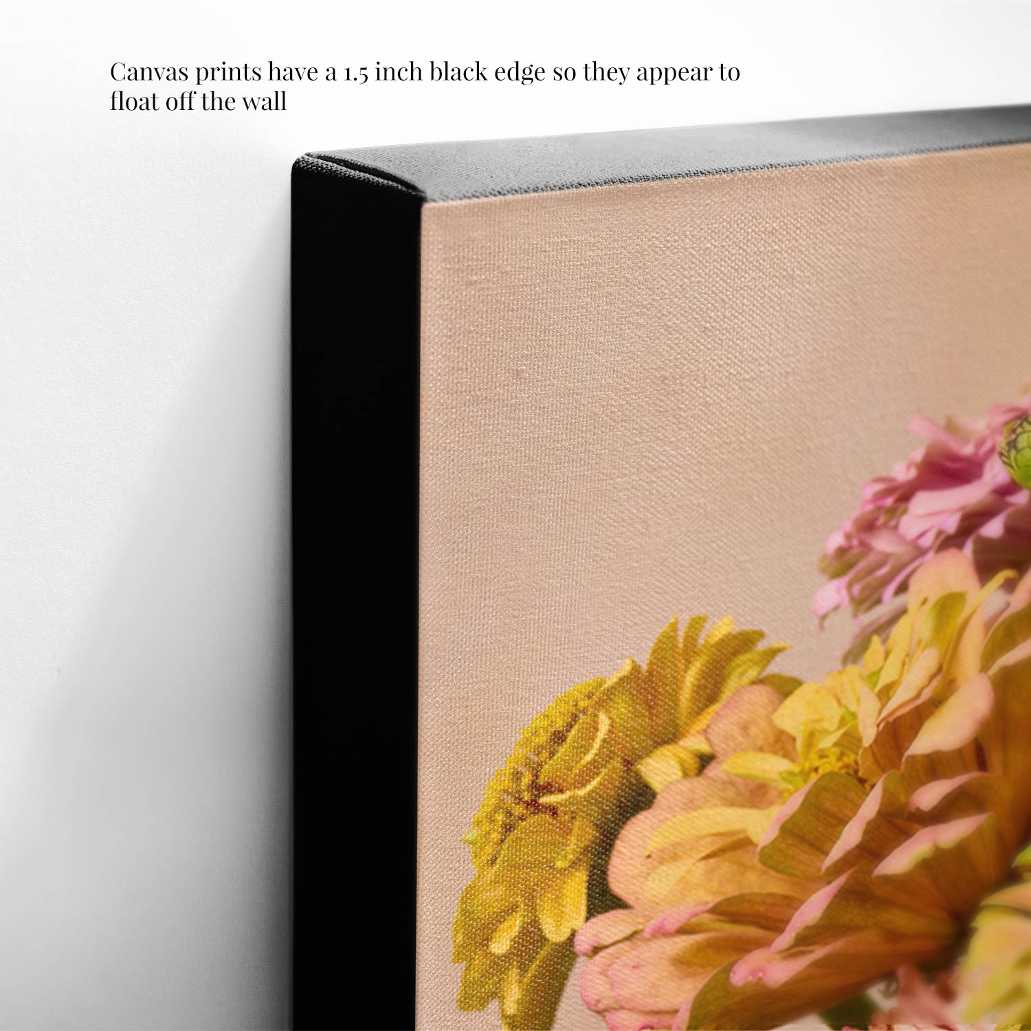 Close-up of the Steeping Beauty canvas wall art print. It features colorful flowers, including yellow and pink blooms, with a 1.5-inch black edge that creates a floating effect on a white wall, reminiscent of fine art paper quality. Text in the corner describes the canvas edge.