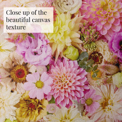 A detailed image of the canvas wall art Christinas Wedding showcases a vibrant floral pattern with pink, yellow, and white flowers featuring intricate petal details and diverse shapes for an artistic composition. This close up shows the beautiful canvas texture.