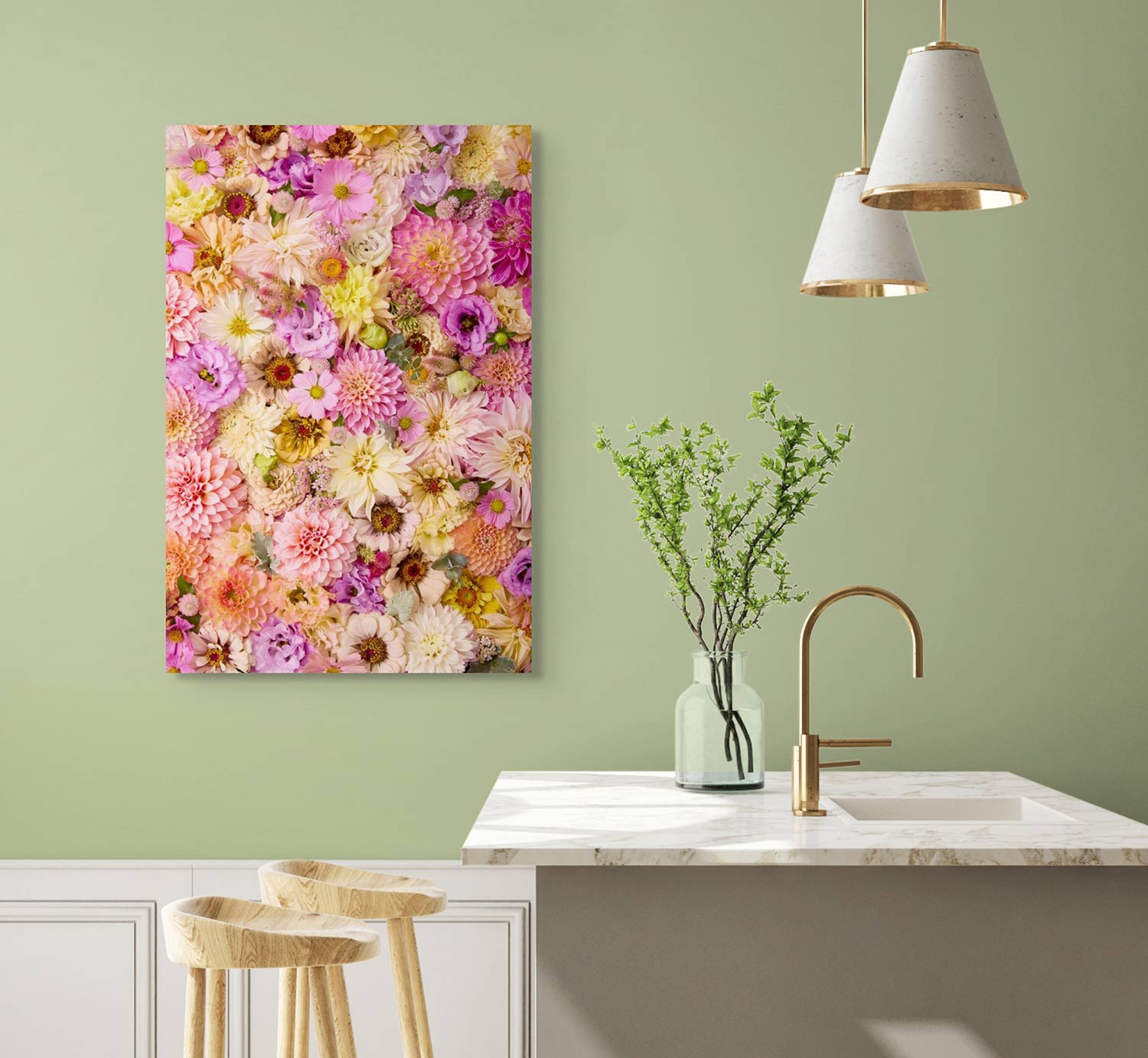 A modern kitchen has light green walls and a marble countertop with a vase of greenery. Two pendant lights hang above. On the wall, a vibrant canvas art piece titled Christinas Wedding, featuring pastel pink and purple flowers, is hung.