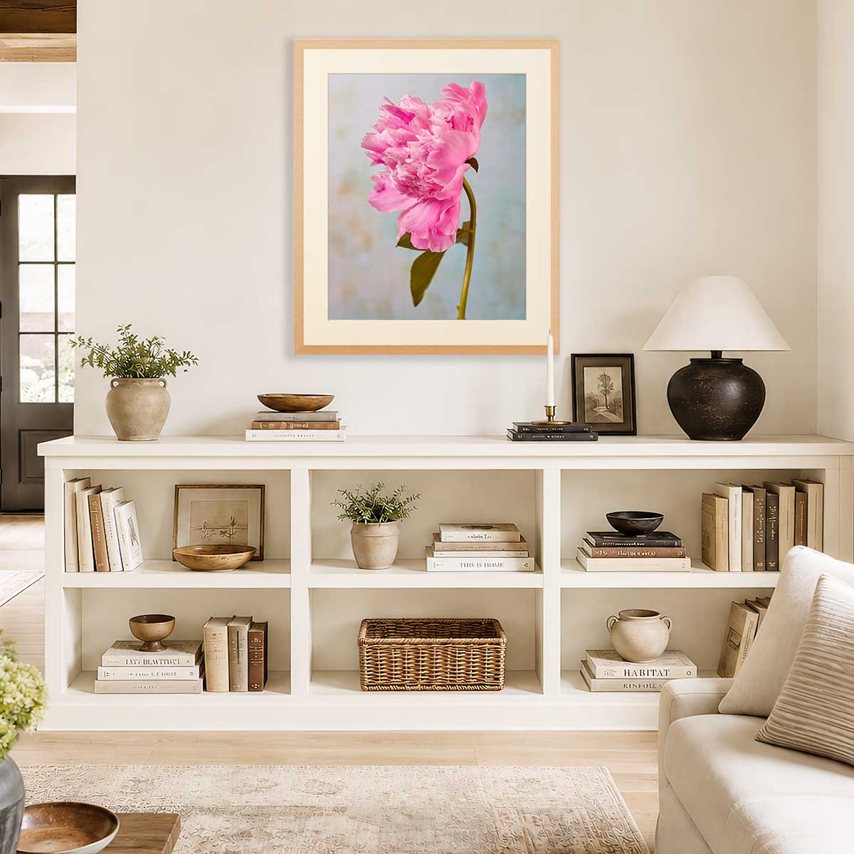 Miss Bashful Peony Wall Art Print with gold frame, pink peony single stem artwork in a living room