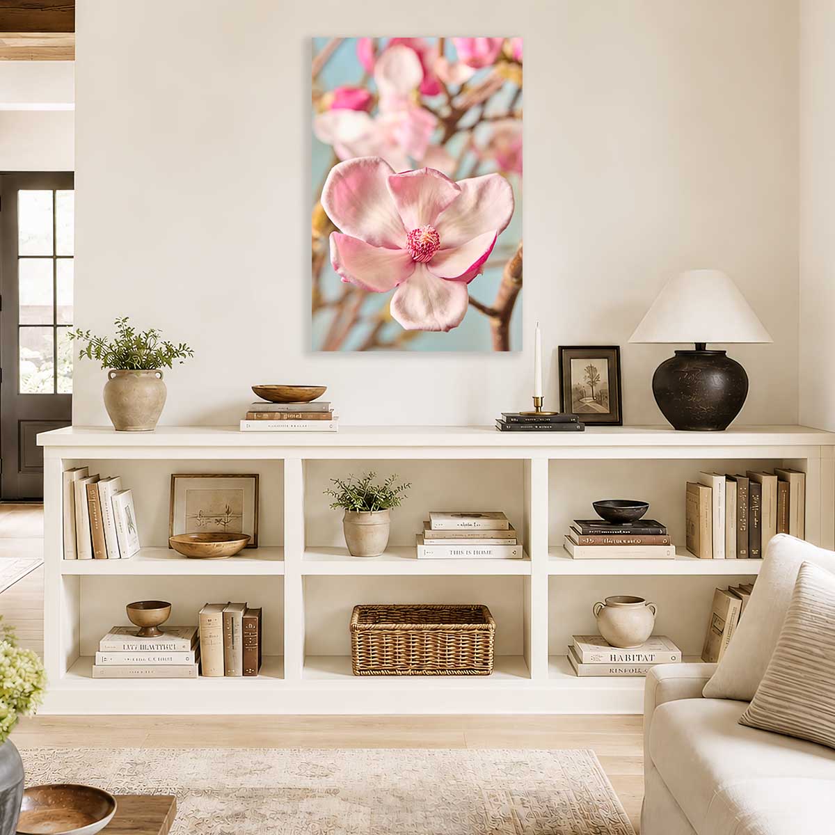 Gentle Radiance Magnolia Wall Art Canvas with magnolia blossom print wall art in a bright living room