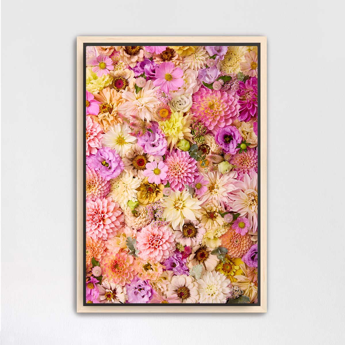 The image is a vibrant and colorful collage of various flowers, including dahlias, roses, and other blooms, arranged in a visually appealing manner.
