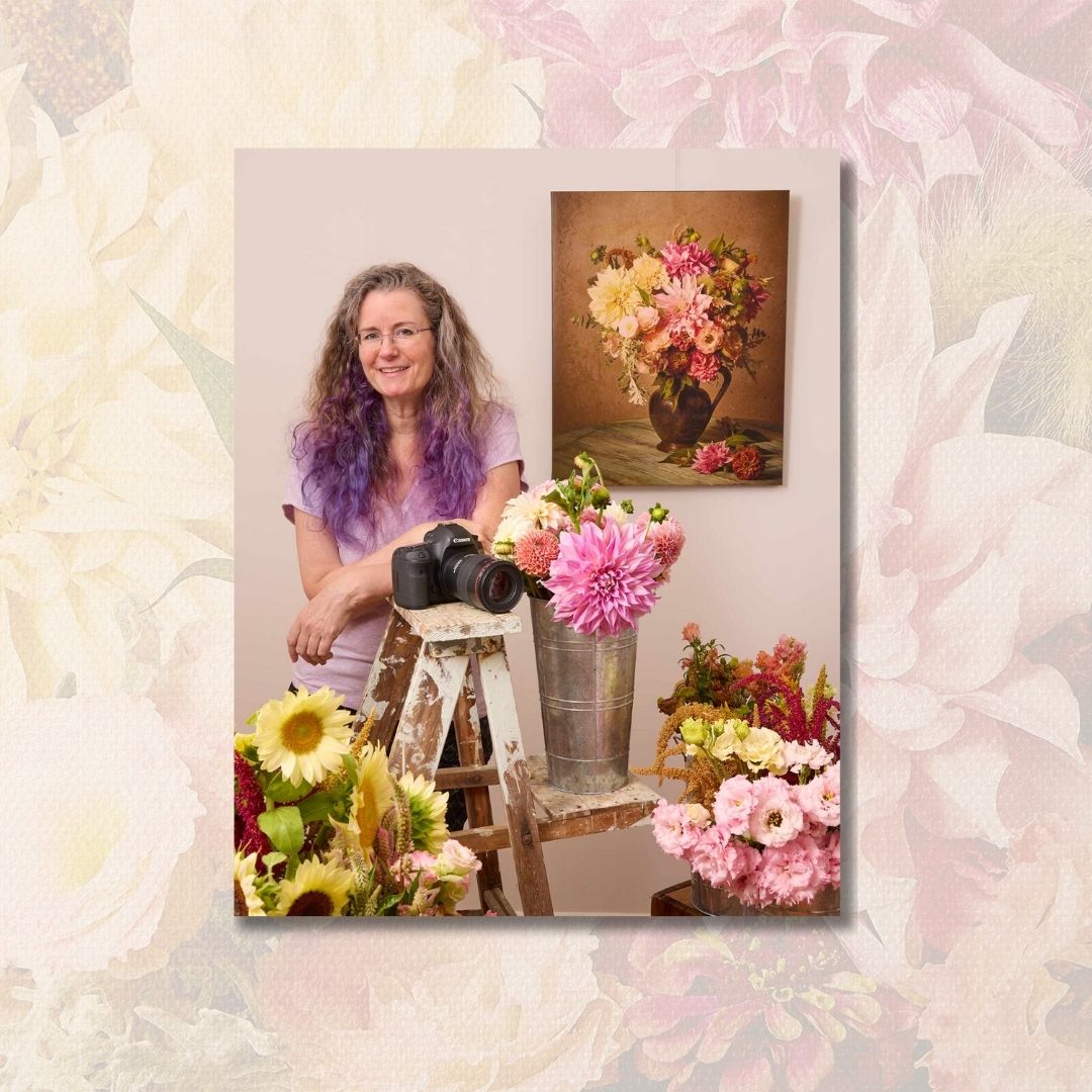 Christina with a camera and flowers, surrounded by floral arrangements on a decorative background