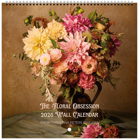 Floral Wall Calendar 2026 – The Floral Obsession By Christina Peters featuring a bouquet of vibrant pink, yellow, and peach flowers in a rustic vase against a warm brown background.