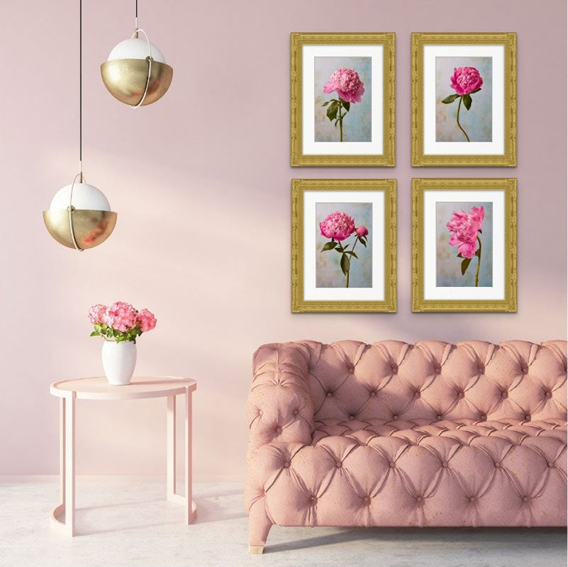 Image of a series of prints of pink peonies on a wall in a pink room